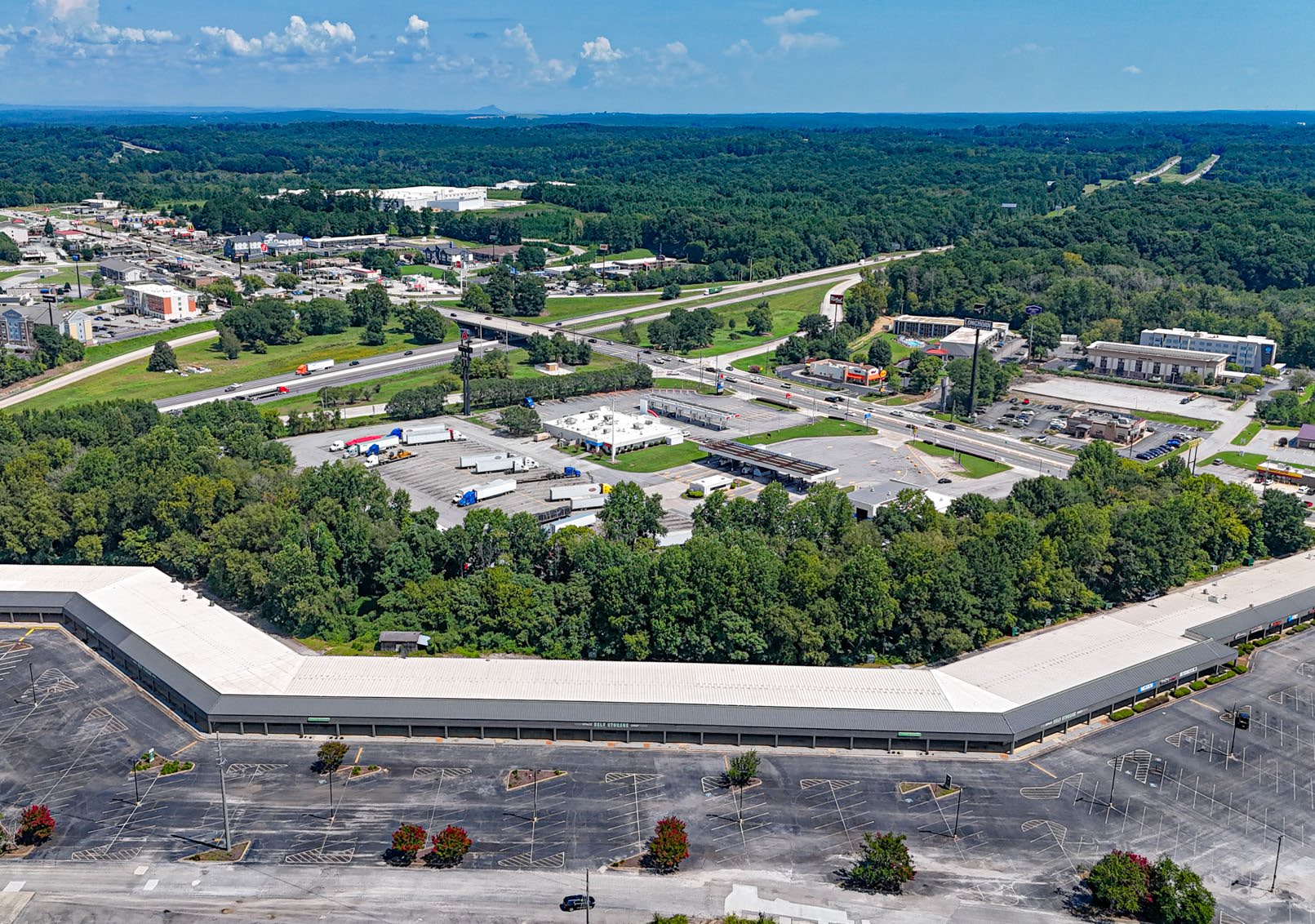 Aerial view of the Space Shop Self Storage facility at 401 Pottery Factory Drive, Commerce, GA with I-85 in the background
